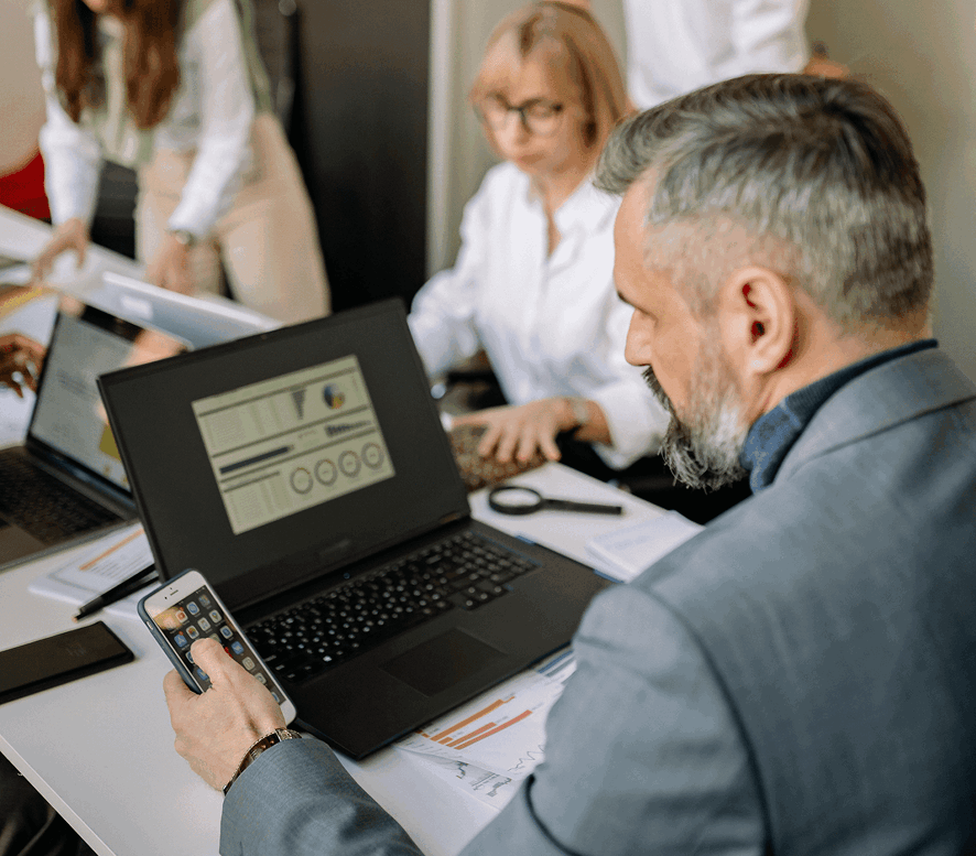 Financial services team reviewing AI-powered analytics